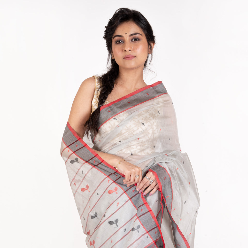 SEA GREY PURE CHANDERI SILK SAREE WITH BLACK BORDER AND DUAL COLOR BOOTI