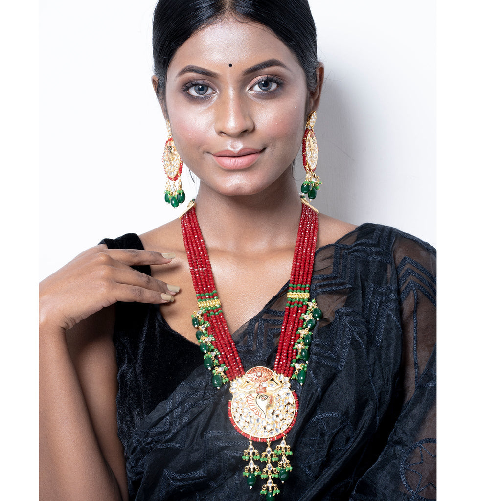 RED CRYSTAL NECKLACE SET WITH GOLDEN PENDANT AND MEENAKARI