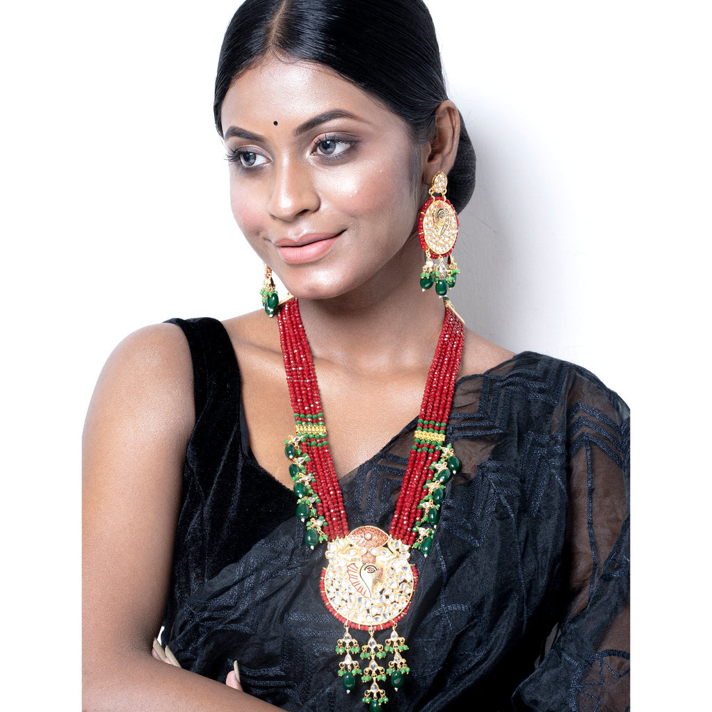 RED CRYSTAL NECKLACE SET WITH GOLDEN PENDANT AND MEENAKARI